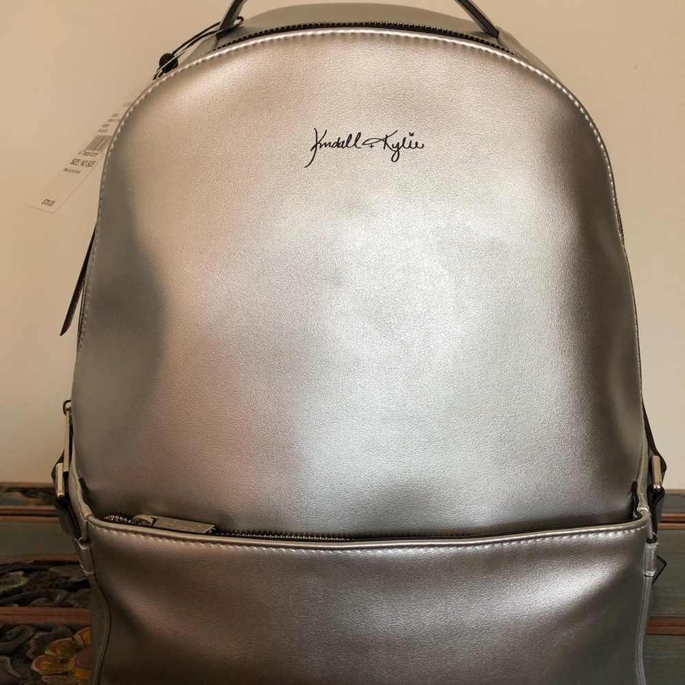 Kendall + Kylie Large Silver Backpack.